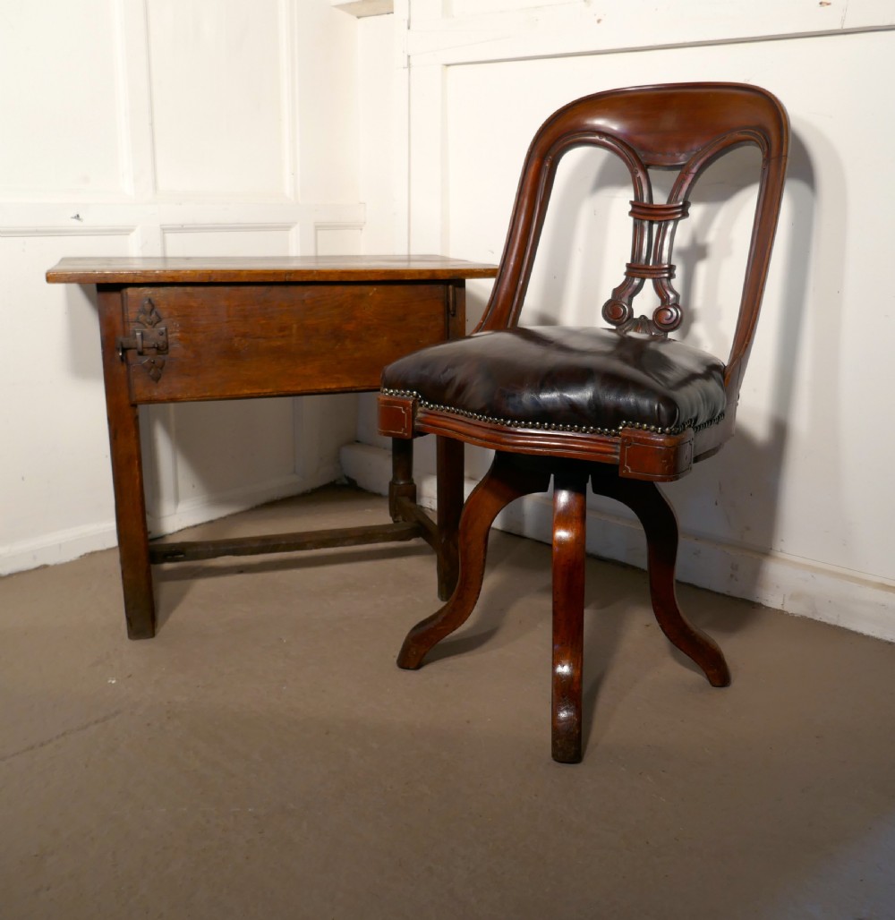 A Victorian Swivelling Mahogany Office Chair or Desk Chair   View II