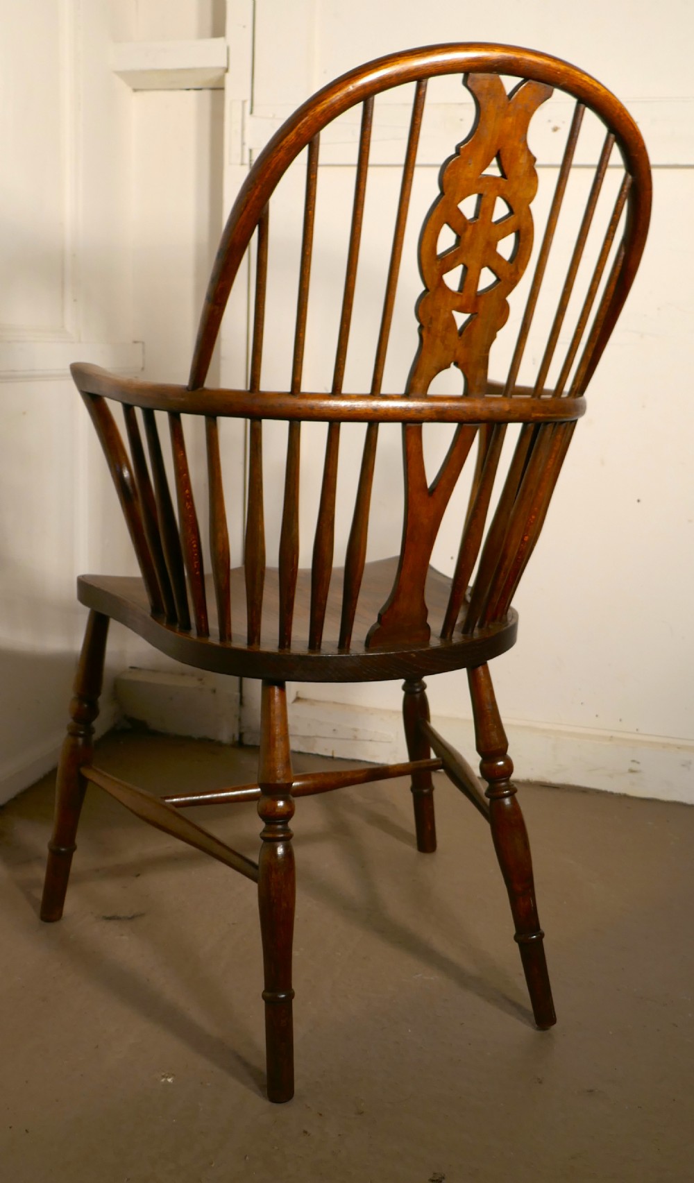 A Georgian Elm and Ash Wheel Back Windsor Carver Chair View VI