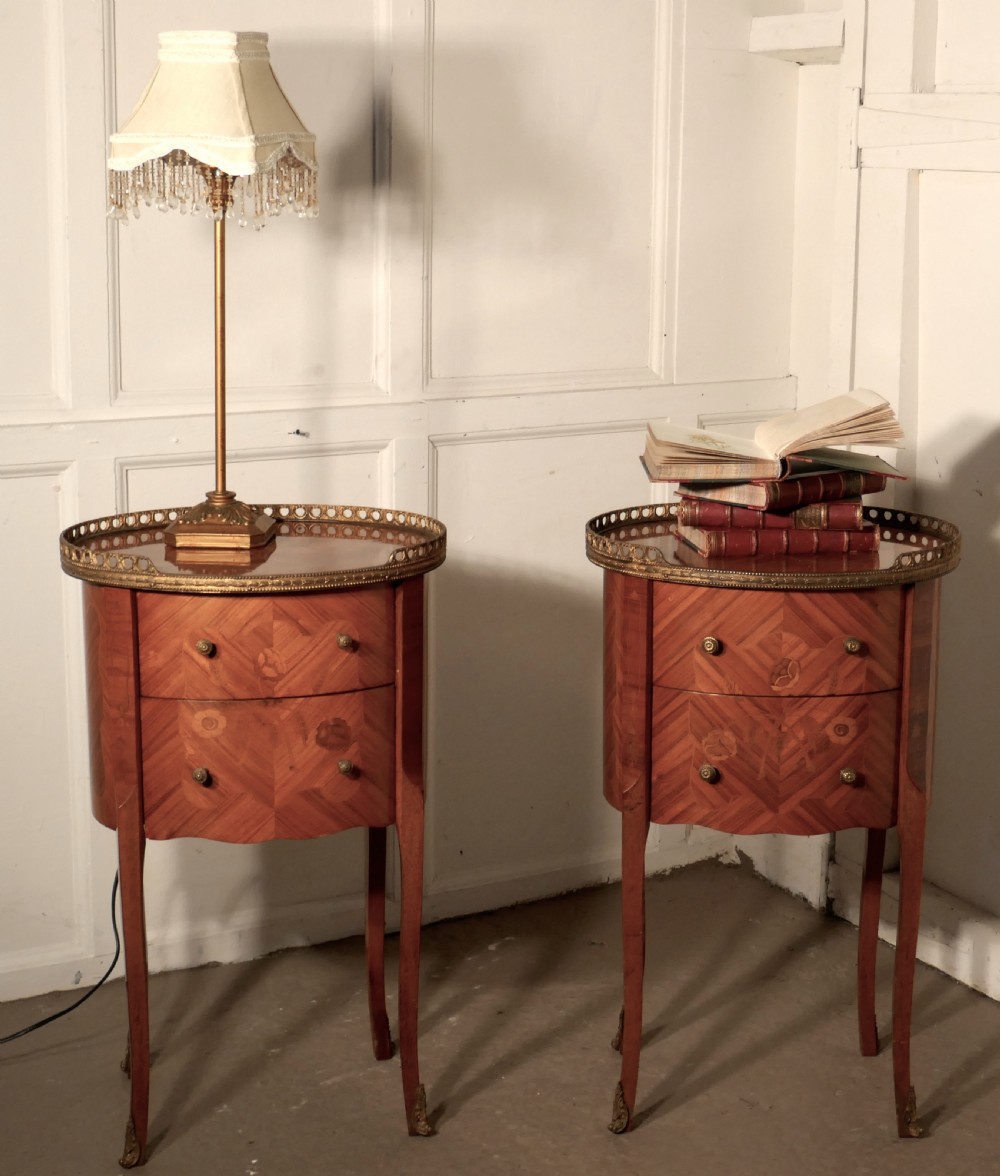 A Pair of French Oval Inlaid Drawer Tables  View II