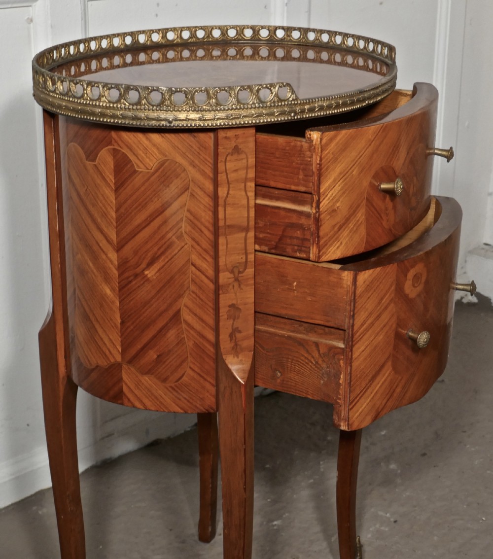 A Pair of French Oval Inlaid Drawer Tables  View III