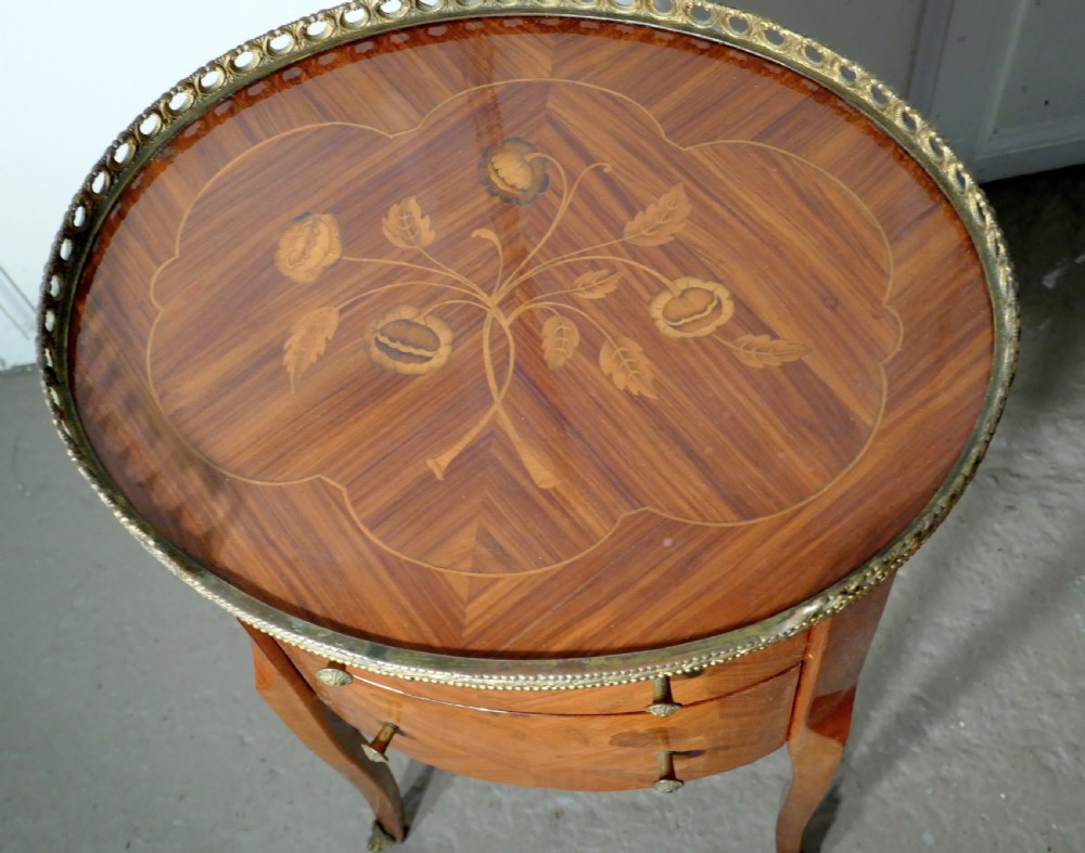 A Pair of French Oval Inlaid Drawer Tables  View VI