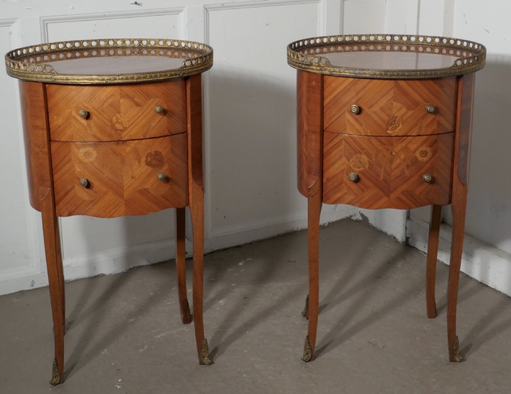 A Pair of French Oval Inlaid Drawer Tables 