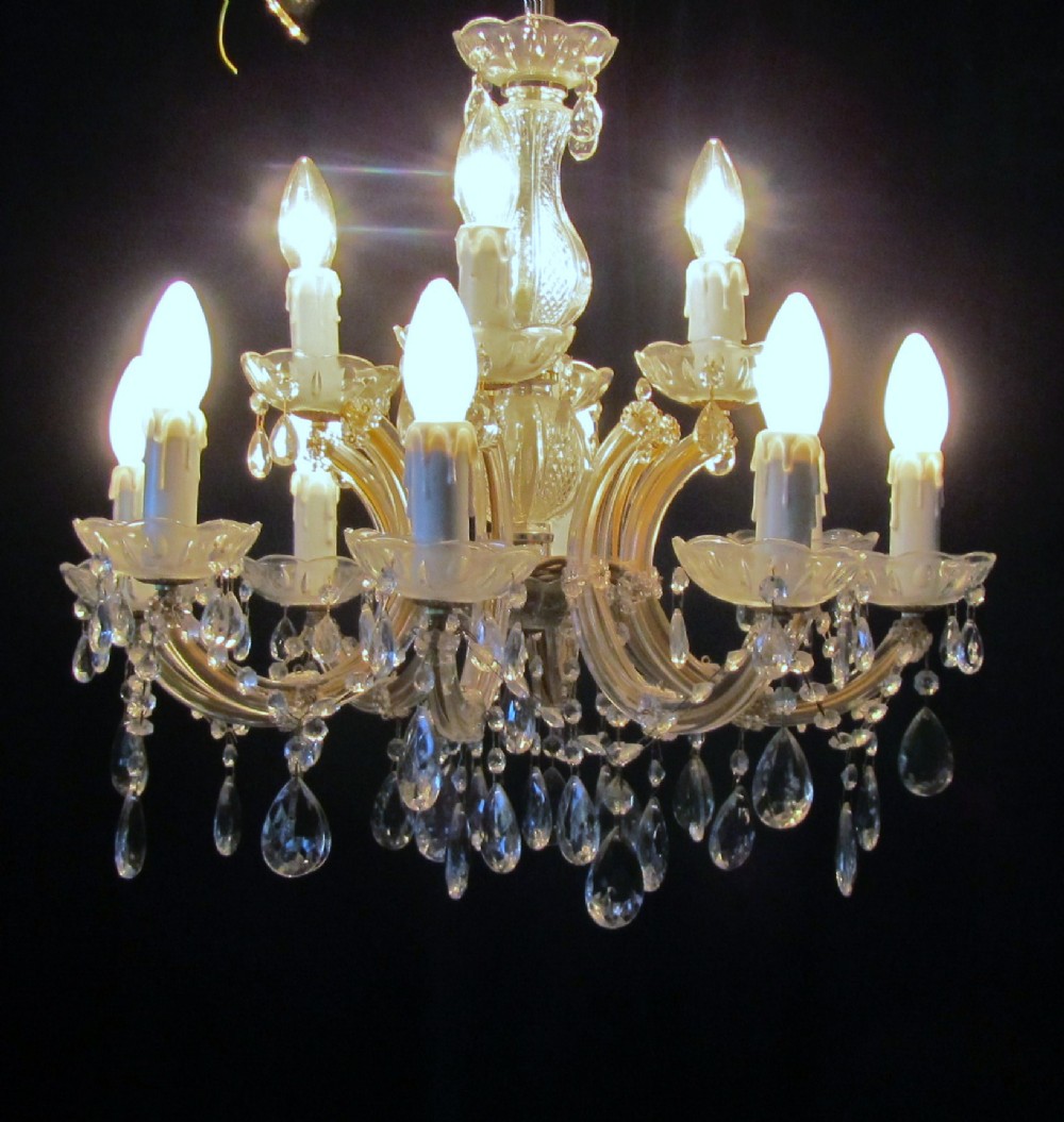 A Charming French Cut Glass and Brass 12 Lamp Chandelier