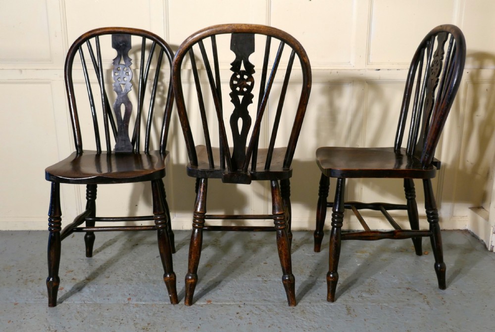 A Set of 6 Early Victorian Beech & Elm Wheel Back Kitchen Chairs View IV
