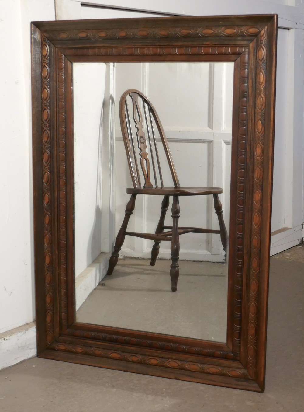 A 19th Century Carved Oak Mirror