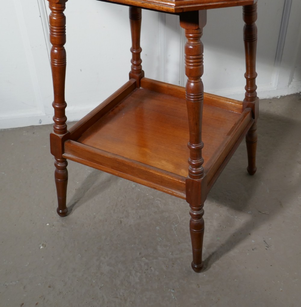 An Edwardian Blonde Mahogany Etagere or Occasional Table View VII