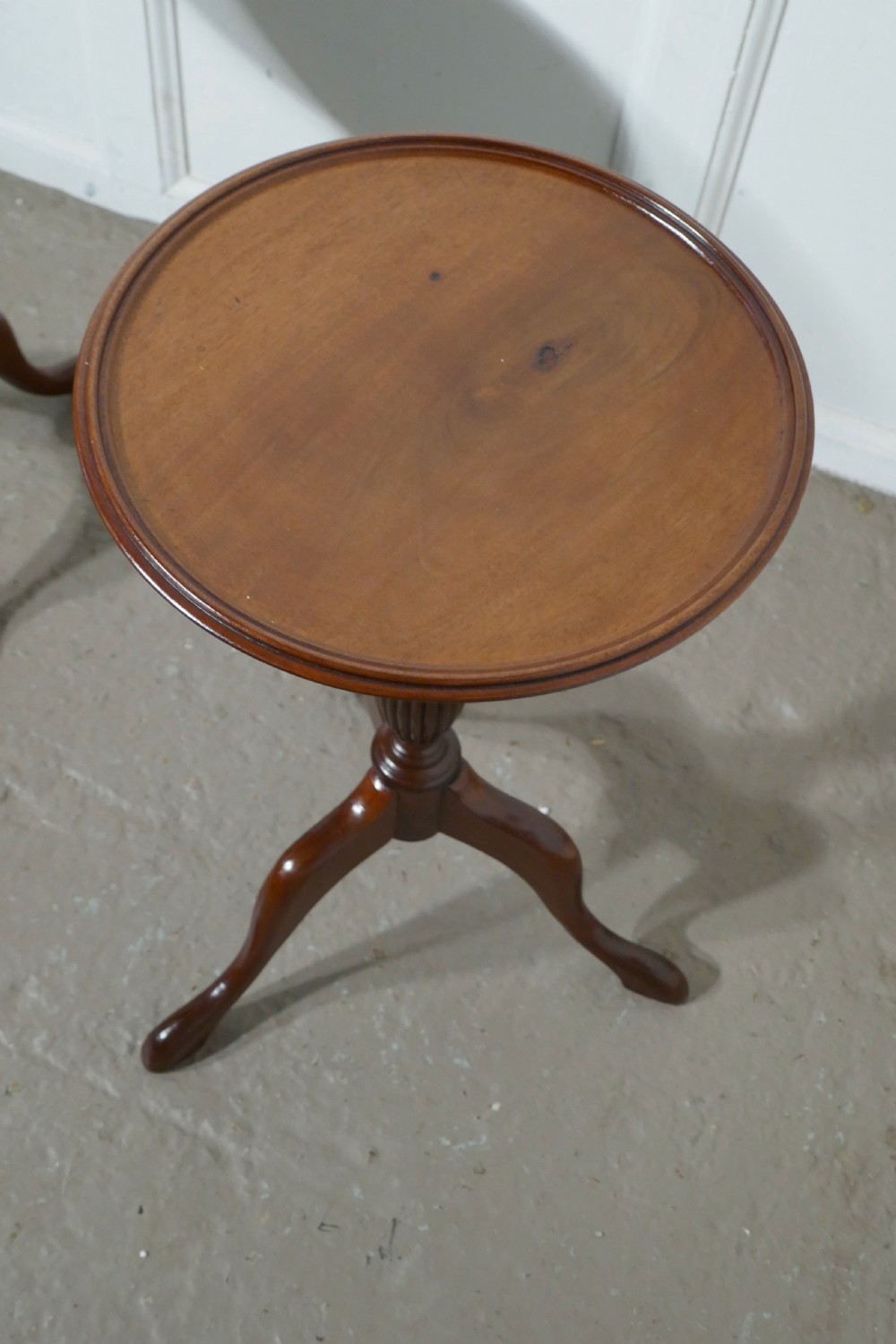 A Pair of Small Mahogany Wine Tables View II