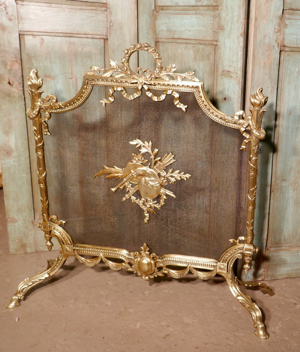 A Superb French Brass Rococo Fire Guard, Spark Screen