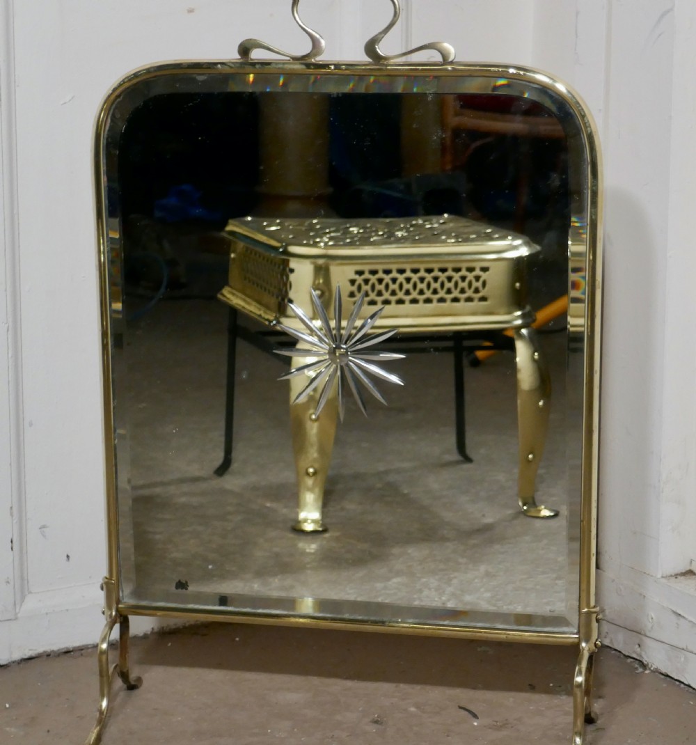 A Victorian Art Nouveau Brass and Sunburst Mirror Fire Screen View II