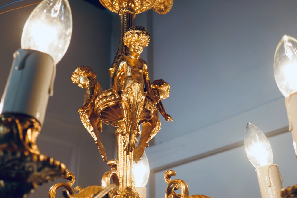 A French Gilded Brass 6 Branch Rococo Cherub Chandelier  View II