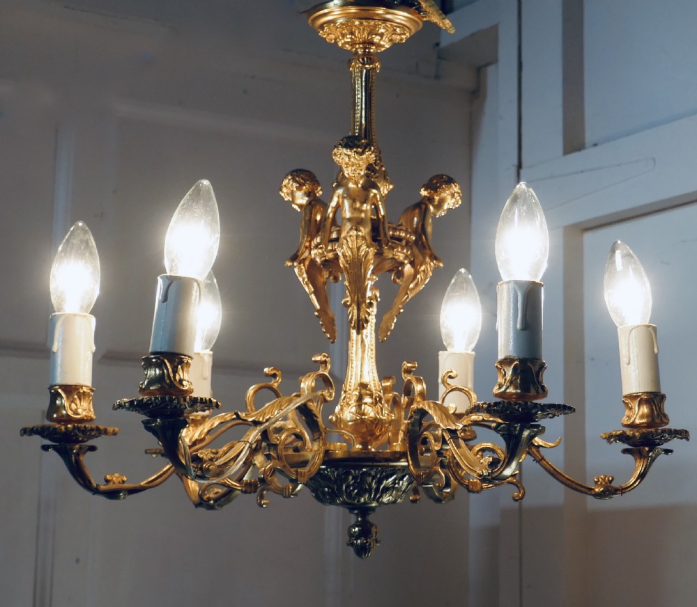 A French Gilded Brass 6 Branch Rococo Cherub Chandelier  View VI