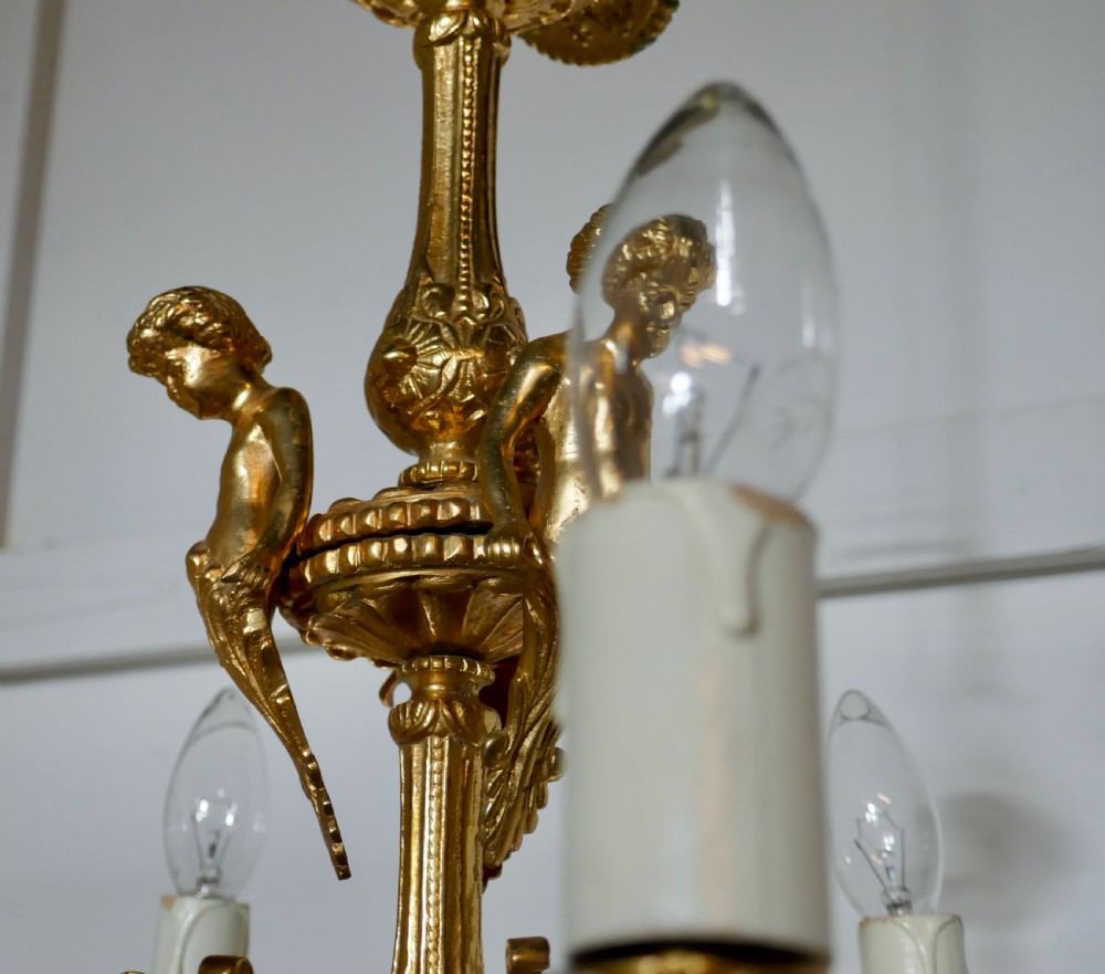 A French Gilded Brass 6 Branch Rococo Cherub Chandelier  View VIII