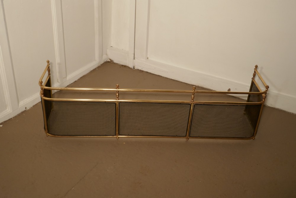 A Large Victorian Brass Club Fender  View II