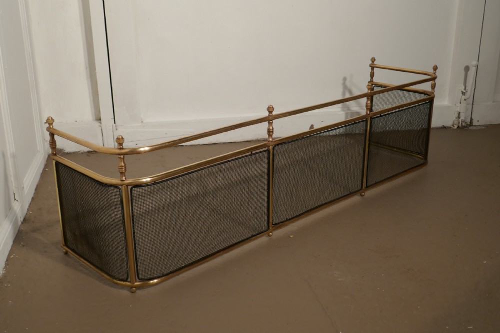 A Large Victorian Brass Club Fender  View IV