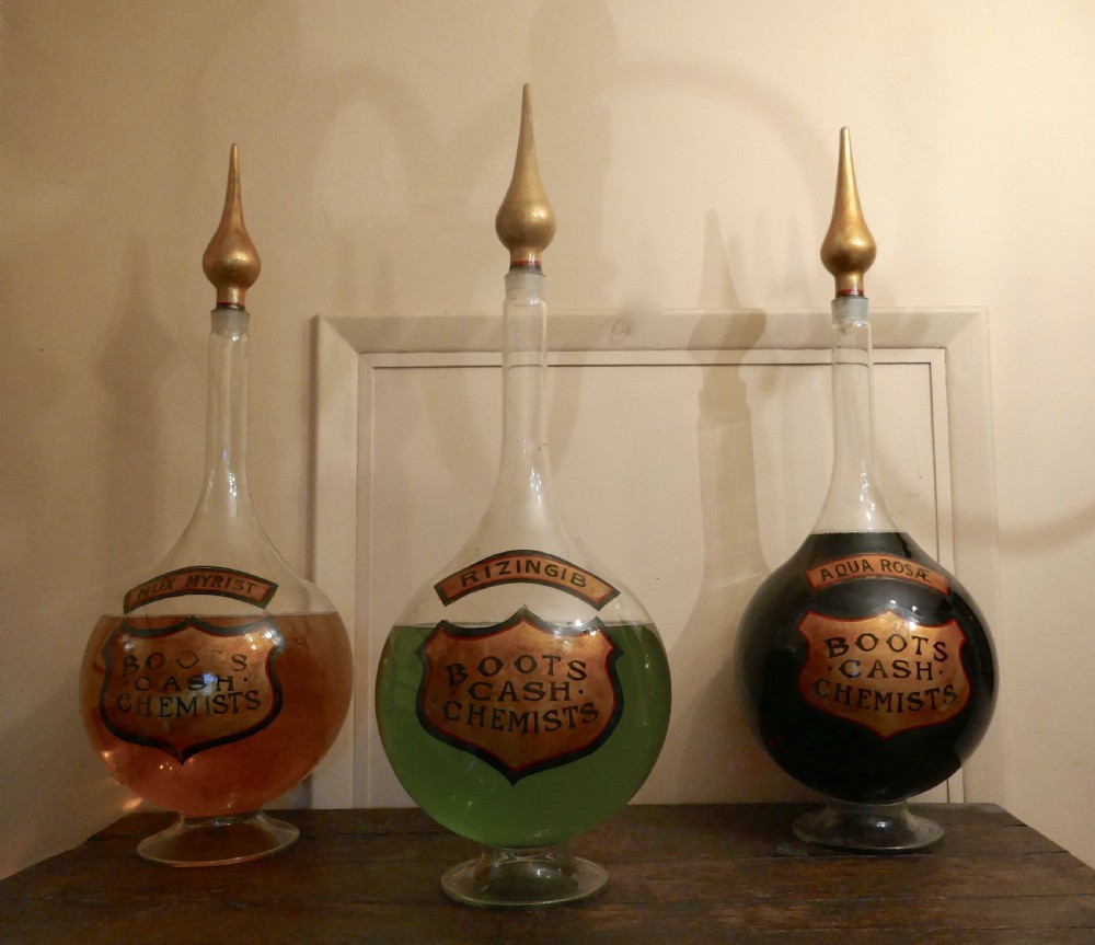 A Trio of Very Large Antique Apothecary or Old Chemist Jars Shop Display   View II