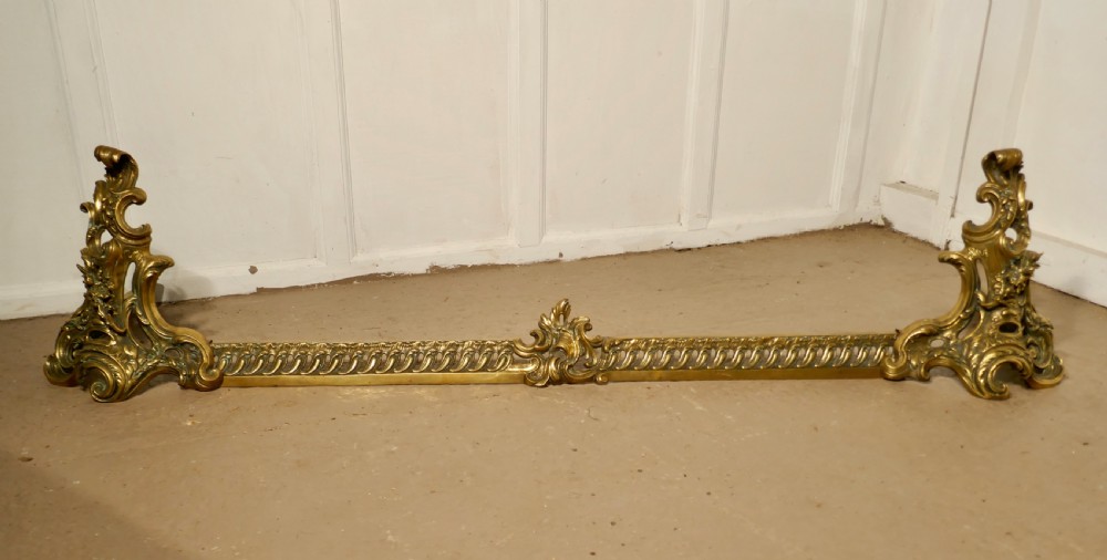 Large French Rococo Brass Extending Fender with Decorative Chenets 