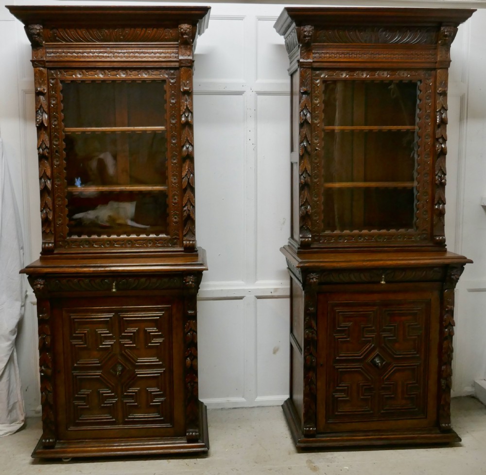 A Pair of French Carved Gothic Oak Bookcases