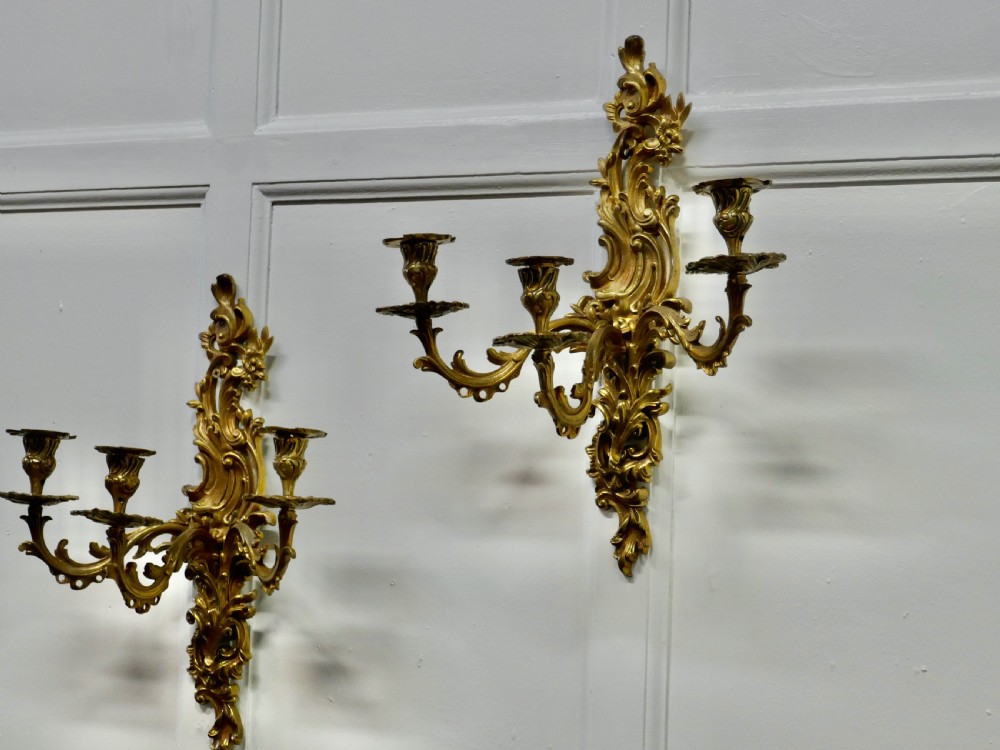 A Pair of Large 19th Century Baroque French Brass Triple Wall Sconces View II