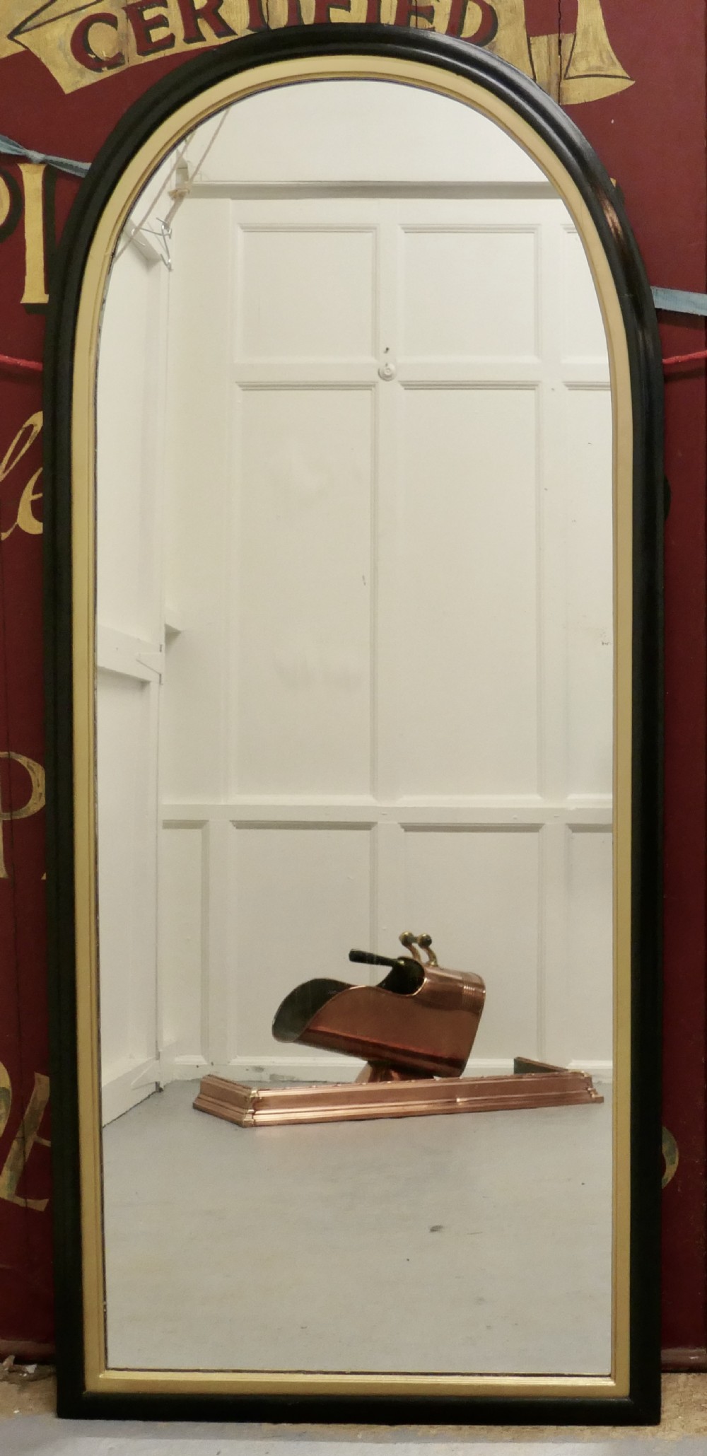 Tall 19th Century Black and Gold Arch Top Wall Mirror