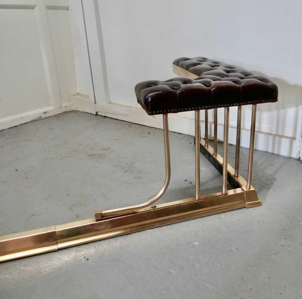 A Lovely Old Adjustable Brass and Leather Club Fender View VIII