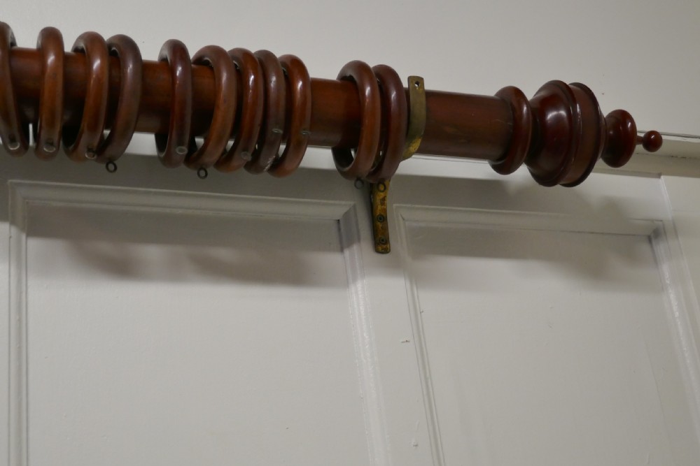 A Very Long Victorian Mahogany Curtain Pole with Rings View XIII