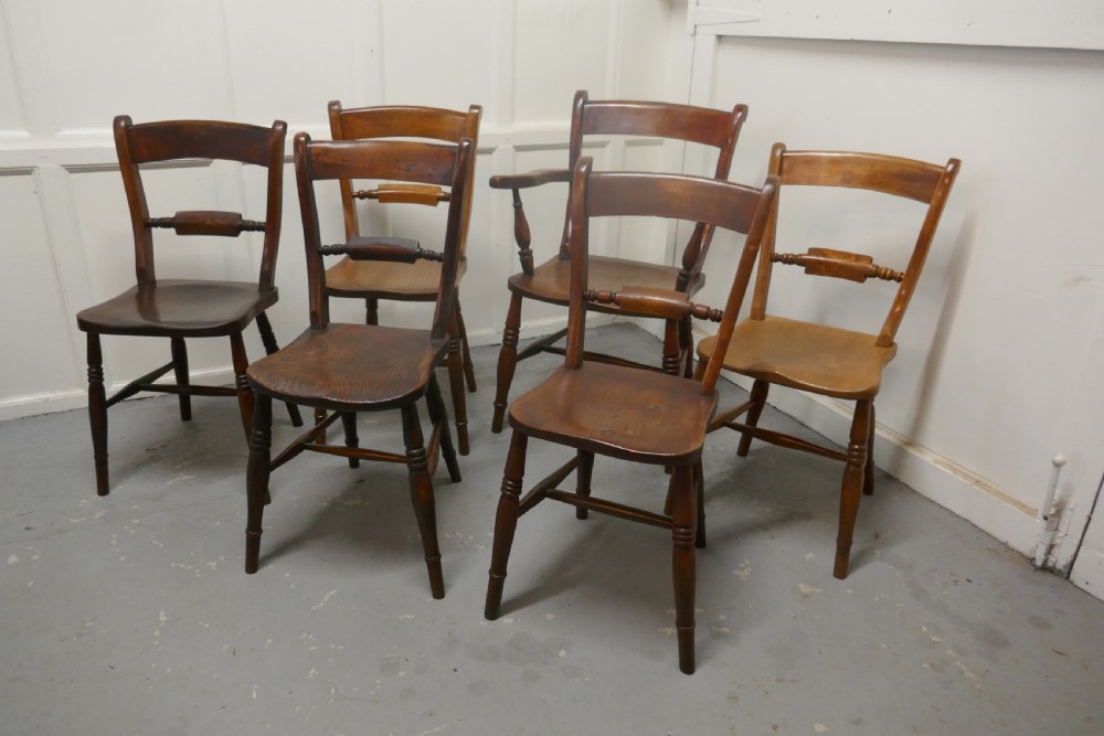 A Harlequin set of 6 Victorian Beech and Elm Rope Back Kitchen Chairs