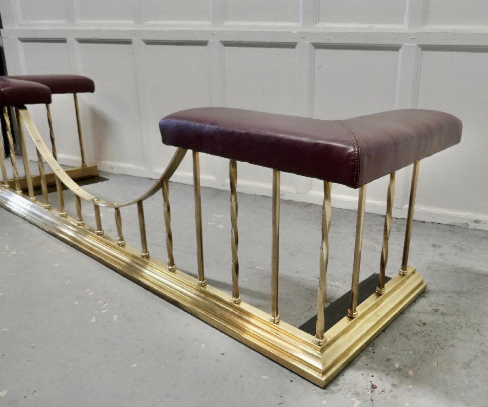 A Superb Large Brass and Leather Club Fender View III