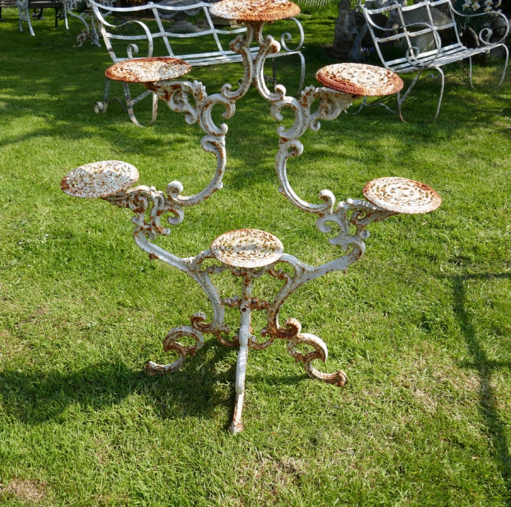 Weathered Cast Iron 6 Branch Plant Stand. View VII