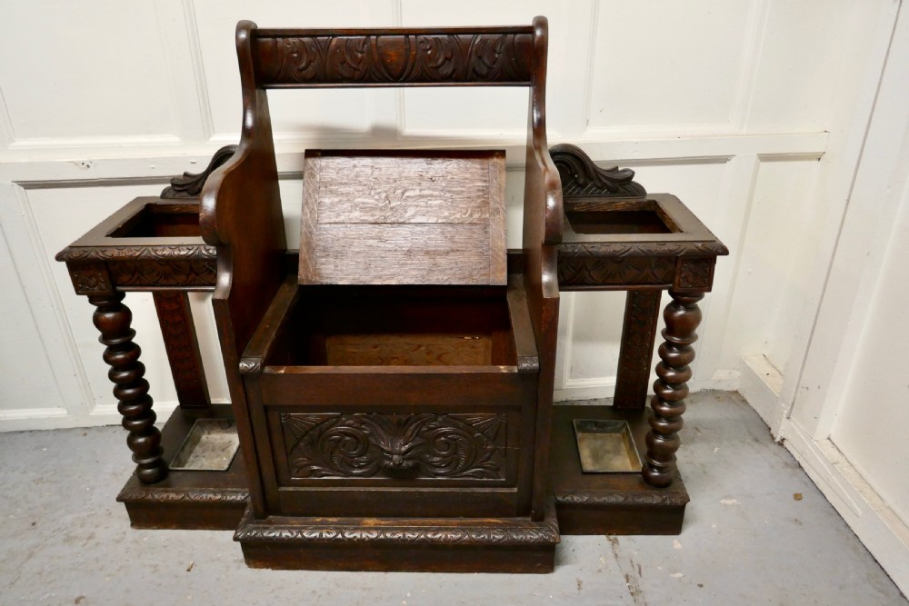 Carved Oak Green Man Hall Settle, with Stick  Stands View V