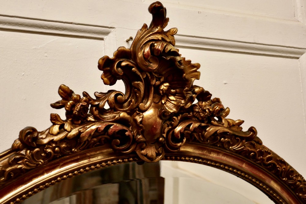 A Superb Late 19th Century Regency Style Oval Gilt Mirror View II
