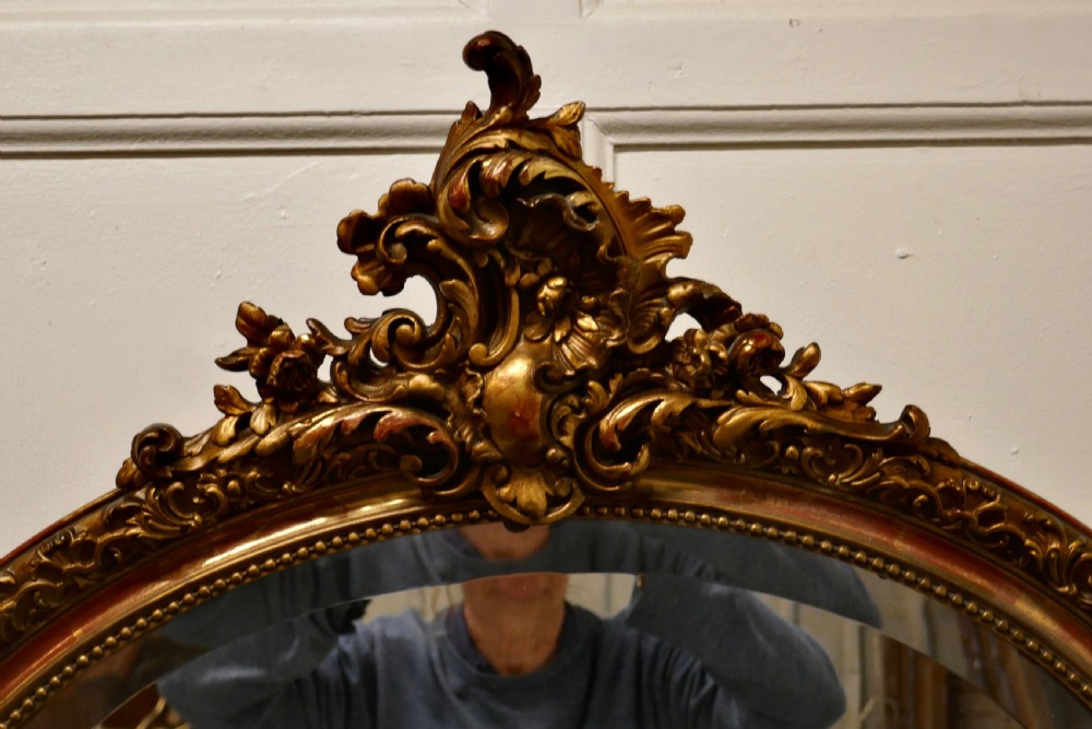 A Superb Late 19th Century Regency Style Oval Gilt Mirror View III