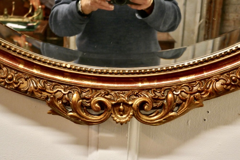 A Superb Late 19th Century Regency Style Oval Gilt Mirror View IV