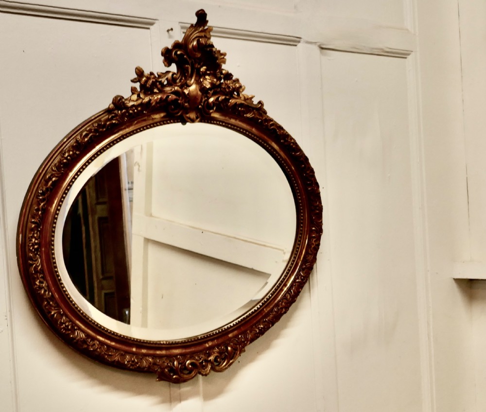 A Superb Late 19th Century Regency Style Oval Gilt Mirror View V