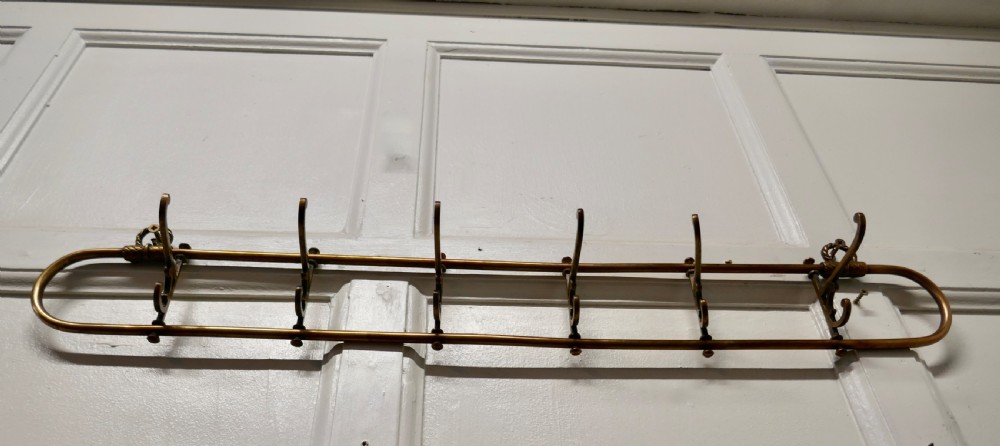Nautical Brass Folding Coat Hook Rack from a Yacht