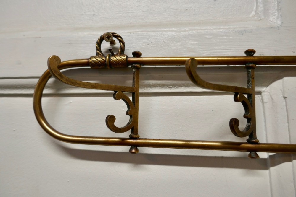 Nautical Brass Folding Coat Hook Rack from a Yacht View V