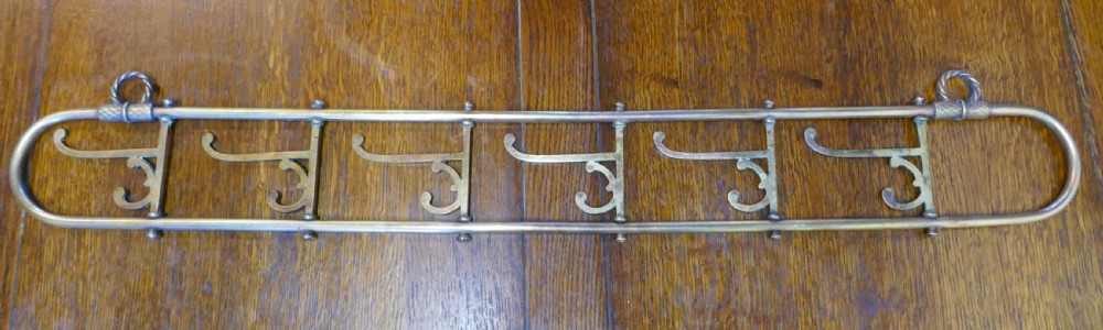 Nautical Brass Folding Coat Hook Rack from a Yacht View X