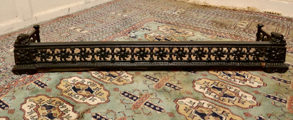 Victorian Arts and Crafts Cast Iron Fender Decorated with Sun Flowers