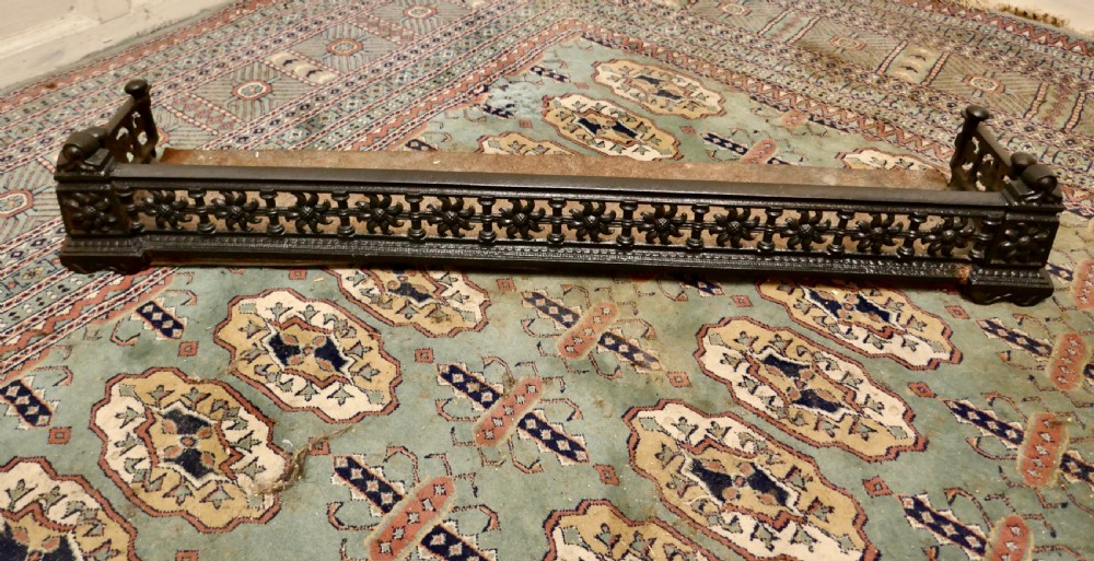 Victorian Arts and Crafts Cast Iron Fender Decorated with Sun Flowers View II