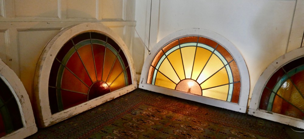 A Set of 4 Large Art Deco Arched Sunburst Stained Glass Windows View V