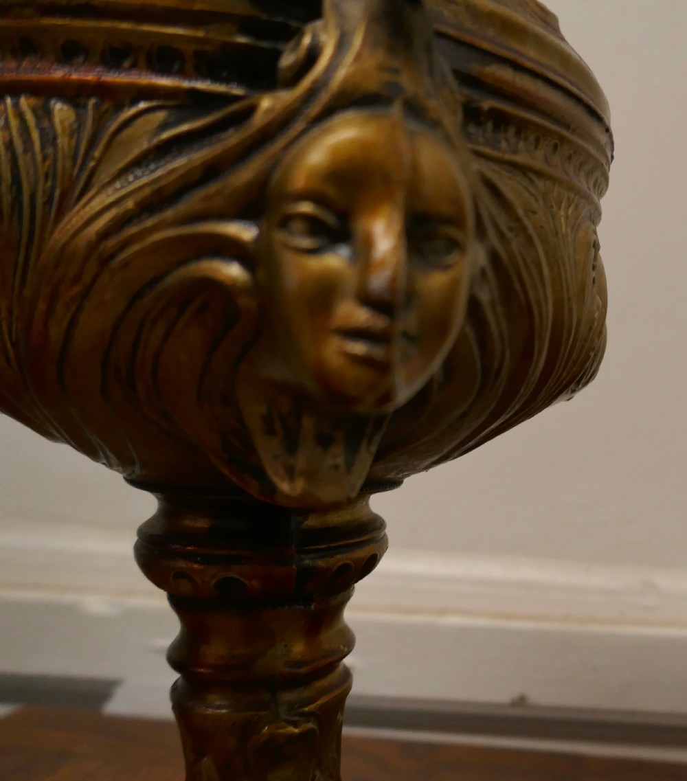 A Pair of  19th Century French Gilt Lamps in the form of Cherubs or Putti   View III