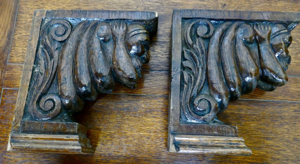 A Pair of Carved Oak Wall Brackets Caryatid Guardians View V