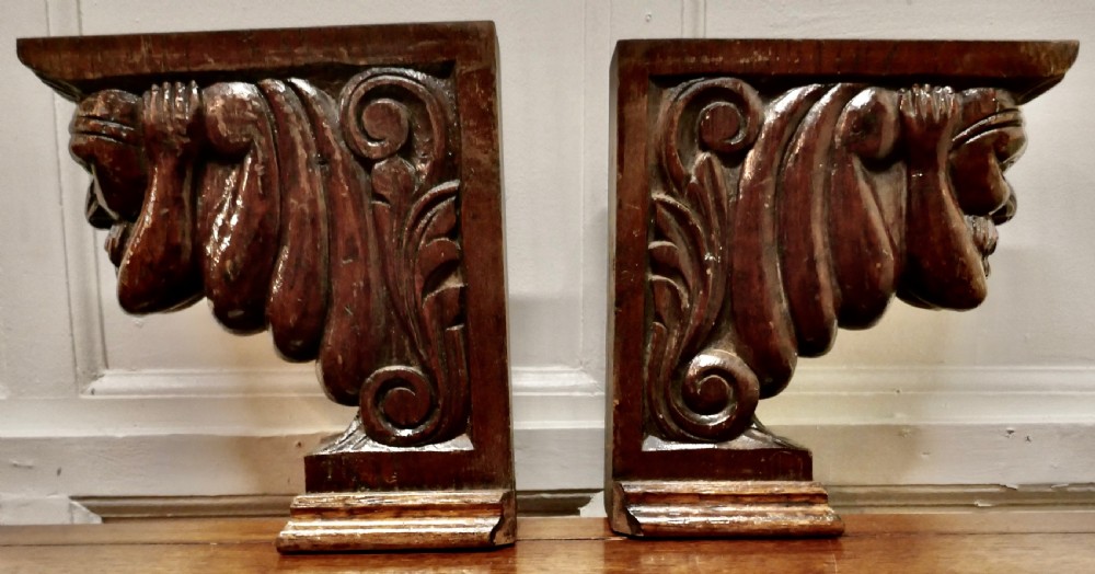 A Pair of Carved Oak Wall Brackets Caryatid Guardians View VI