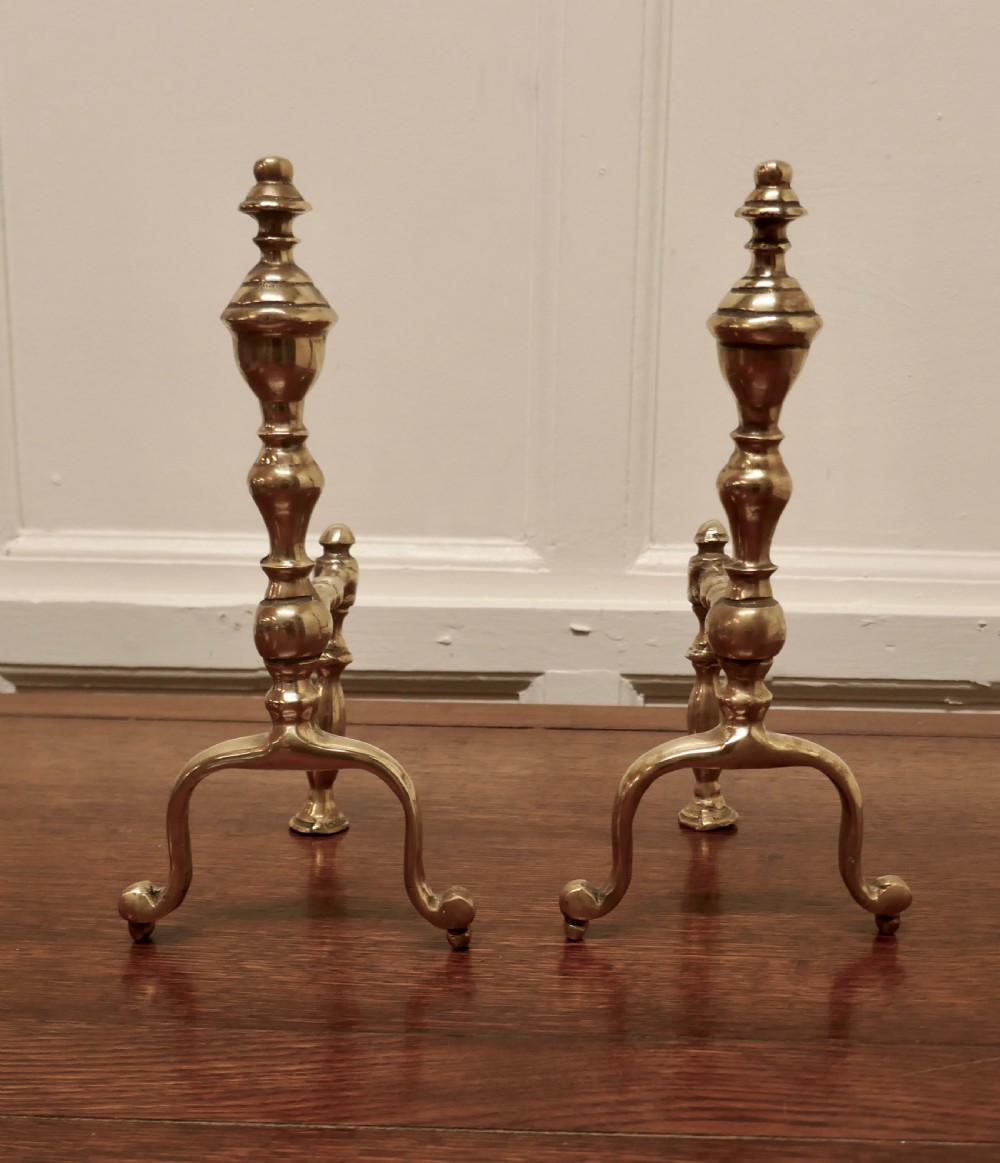 An Elegant Pair of Victorian Brass Andirons or Fire Dogs