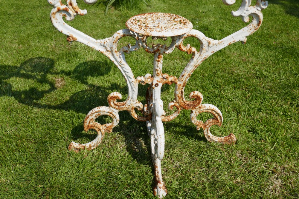 Weathered Cast Iron 6 Branch Plant Stand. View IV