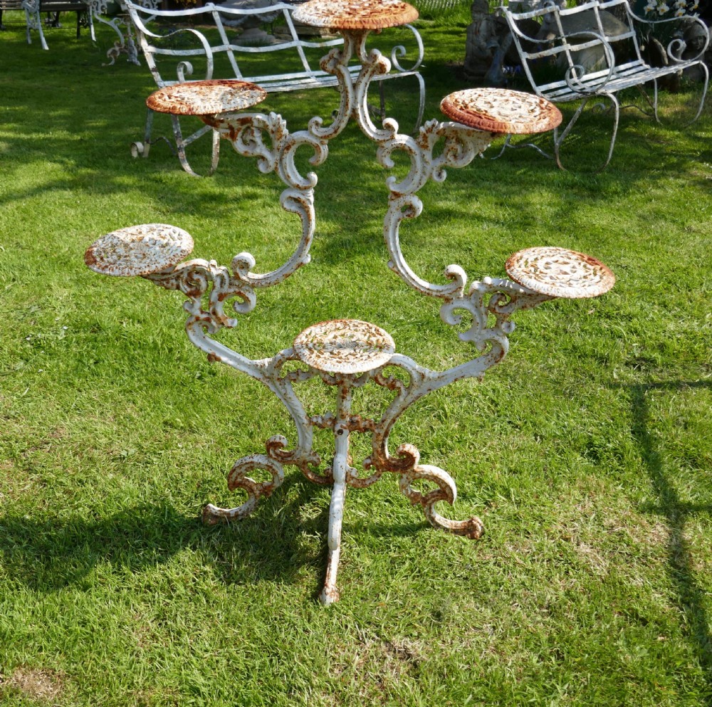 Weathered Cast Iron 6 Branch Plant Stand. View VII