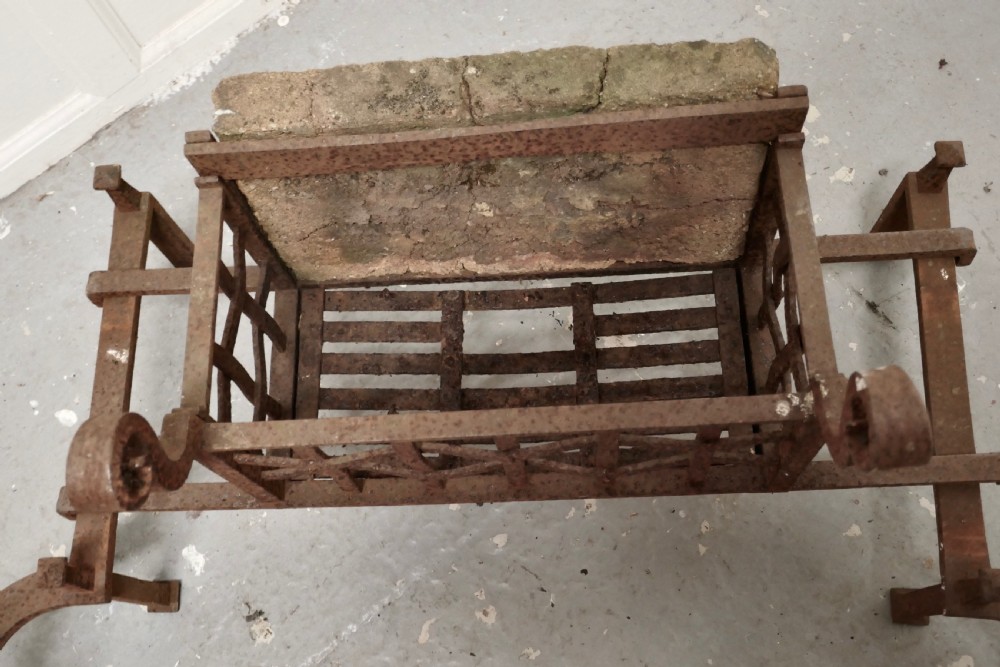 A Large Inglenook Fire Grate set on Andirons View V