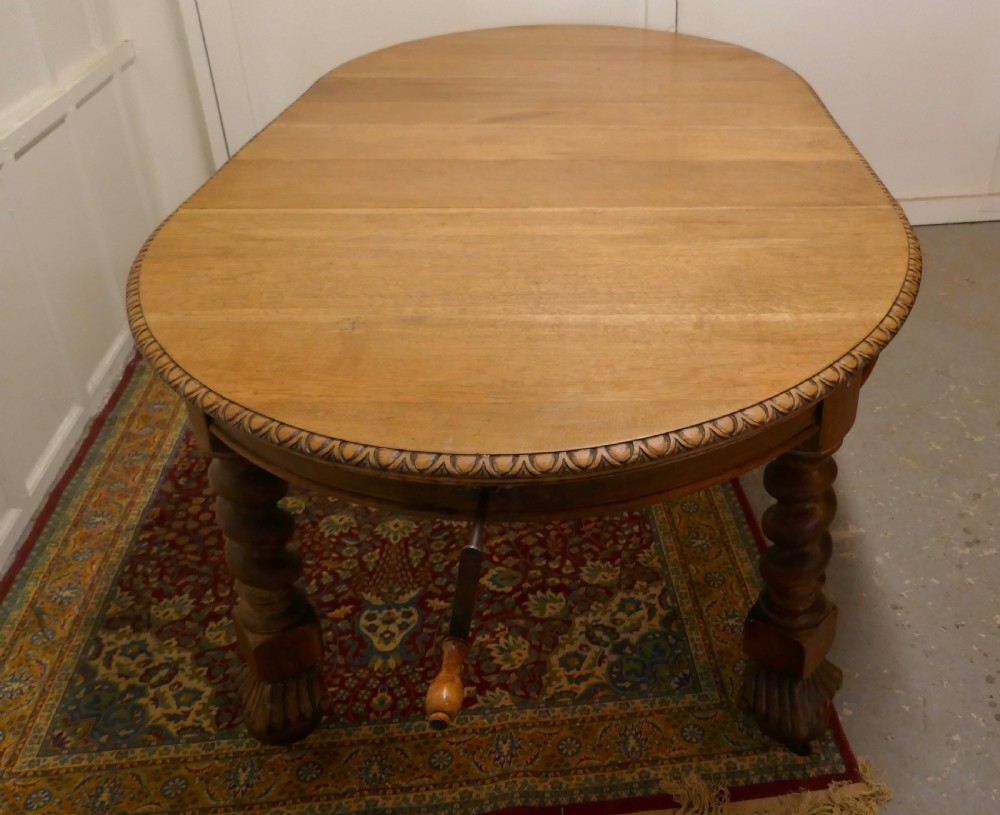 A Large Victorian  Golden Oak Oval Extending Dining Table  View IV