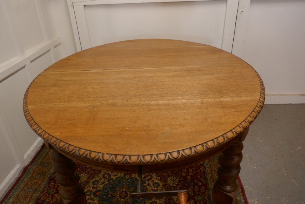 A Large Victorian  Golden Oak Oval Extending Dining Table  View VIII