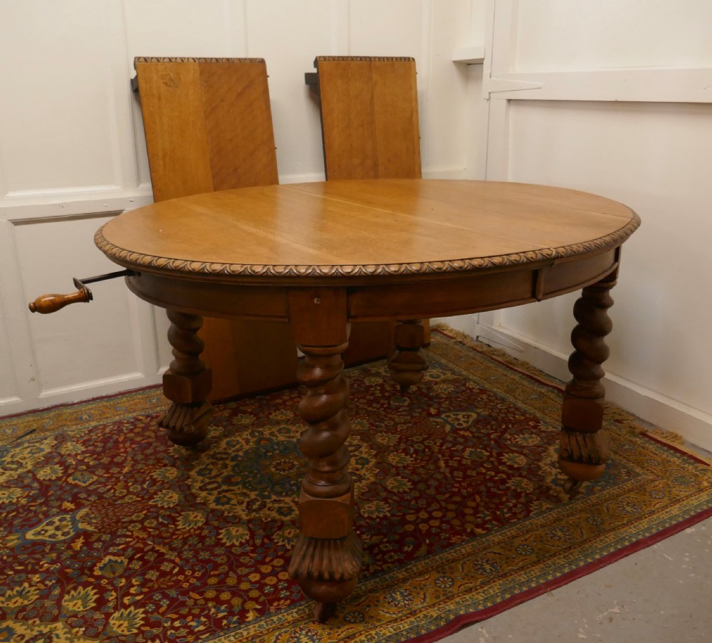 A Large Victorian  Golden Oak Oval Extending Dining Table  View XI