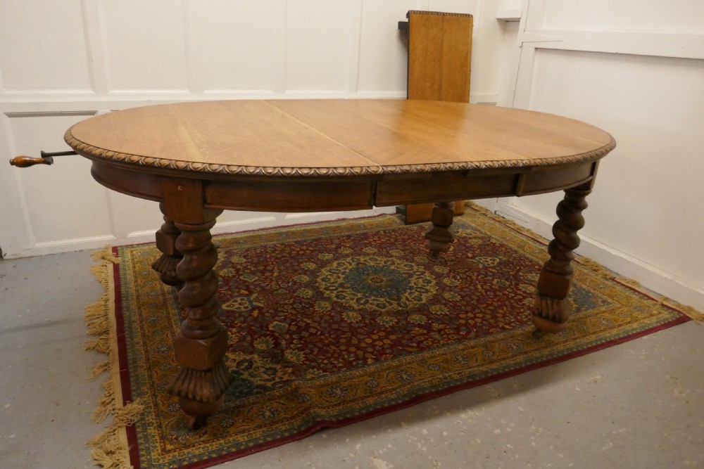 A Large Victorian  Golden Oak Oval Extending Dining Table  View XII